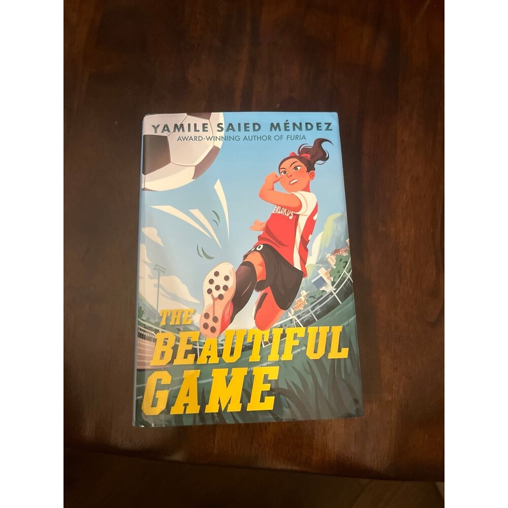 The Beautiful Game by Yamile Saied Mendez